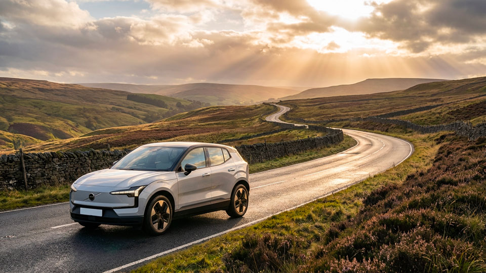 Volvo EX30 electric SUV on a winding Yorkshire Dales road